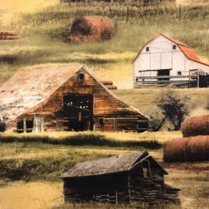 Farm Buildings and Rolls of Hay on Greener Pastures